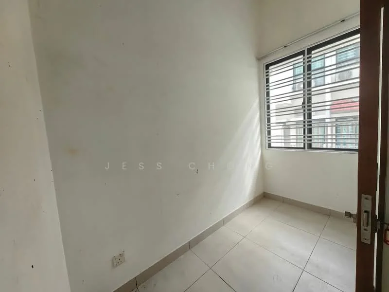 Room features: white painted walls, tile flooring, large window with horizontal metal grilles, natural light from window, corner room, neutral color scheme.