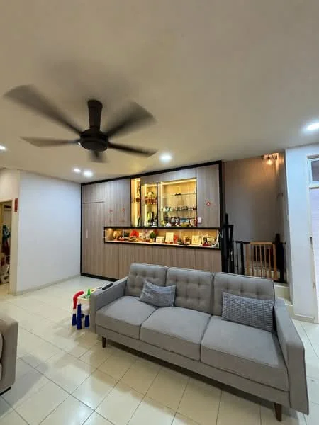 Living features: 3-seater fabric sofa in grey, ceiling fan with light, built-in cabinetry with glass display, tile flooring, neutral wall colour, decorative wall lighting, open layout, staircase visible in background, decorative items on shelves; style: modern.