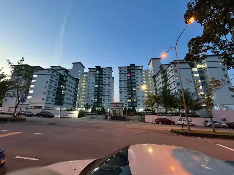 Exterior type: mid-rise condominium; features: white painted facade, glass windows, balconies on each unit, landscaped entrance area, paved driveway, street lighting, surrounding palm trees, multiple storeys, visible parking area; style: modern.