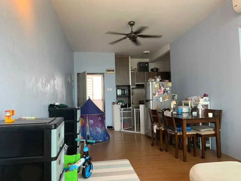 Living features: light blue painted walls, wood laminate flooring, 5-blade ceiling fan, dining table with 6 chairs, black storage unit, play tent, green tricycle, refrigerator, kitchen cabinets, open kitchen layout, white baby gate; style: modern.
