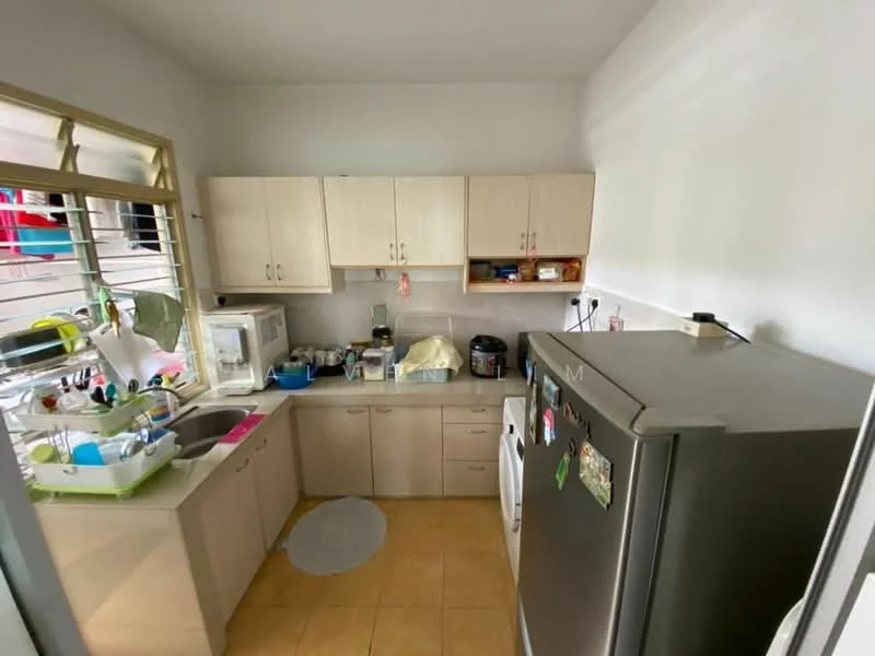 Kitchen features: light wood cabinetry, white countertop, double-bowl stainless-steel sink, chrome pull-down faucet, microwave, refrigerator, washing machine, tile flooring in beige, window with metal grille, kitchen towels, dish rack, various kitchen utensils, decorative items on shelves; style: modern.