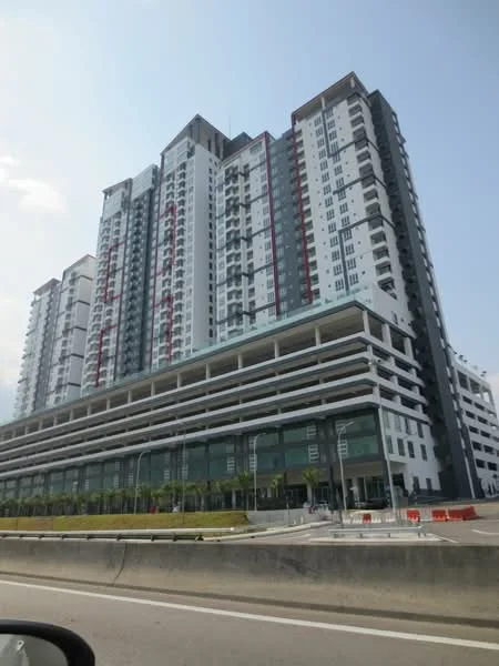 Exterior type: high-rise condominium; features: glass curtain wall, white painted facade, grey accent panels, recessed balconies, multi-storey car park, landscaped ground level, modern architectural design, approximately 20-storey high-rise; style: modern.