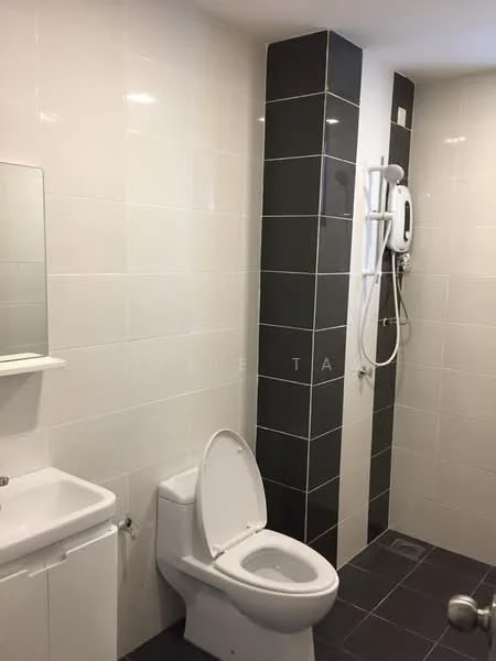 Bathroom features: white tiled walls, dark grey accent wall, black tile flooring, single-sink vanity with white cabinet, framed mirror, one-piece toilet, shower with wall-mounted showerhead, chrome faucet, built-in shelf, shower curtain rod; style: modern.