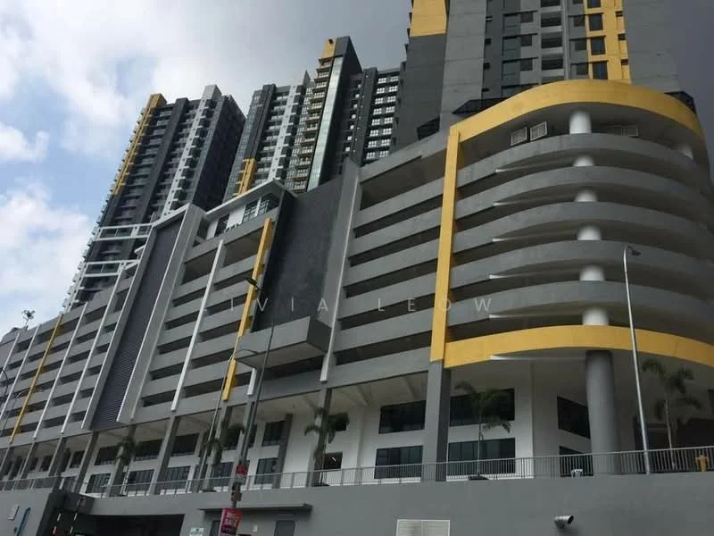 Exterior type: high-rise condominium; features: grey concrete facade, yellow accent features, balconies with railings, multiple storeys, parking deck, landscaped areas with palm trees, large windows, modern architectural design; style: modern.