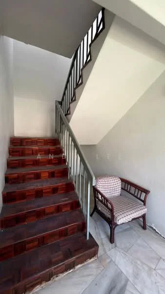 Room features: wooden staircase with railing, marble flooring, wooden steps, white painted walls, small armchair with patterned upholstery; style: modern.