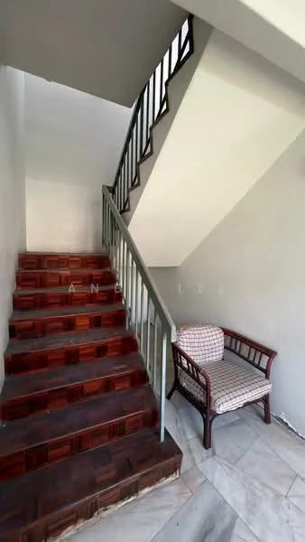 Room features: wooden staircase with handrail, marble flooring, white painted walls, small upholstered armchair, landing area at top of stairs; style: modern.