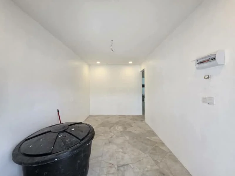 Room features: white painted walls, marble tile flooring, ceiling lights, wall-mounted air conditioning unit, black trash bin.