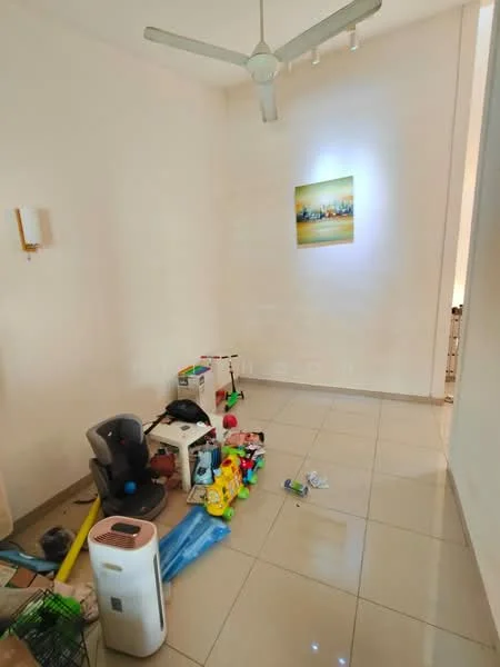 Room features: white painted walls, glossy tile flooring, ceiling fan, wall-mounted light fixture, artwork on wall, various toys scattered on floor, air purifier, small furniture pieces, cluttered space.