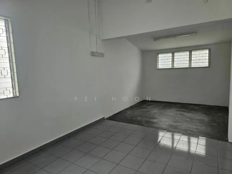 Room features: white painted walls, grey concrete flooring, 2 small windows with grid pattern, fluorescent ceiling lights.