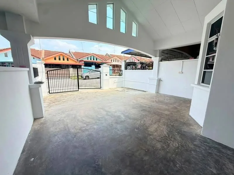 Exterior type: linked terrace house; features: concrete flooring, white painted walls, arched entrance, gated entry, manicured lawn, surrounded by residential houses, driveway, natural light from windows, sloped roof, front porch area; style: modern.