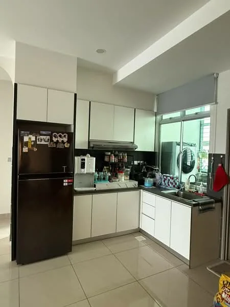 Kitchen features: black stainless-steel fridge, built-in oven, stainless-steel sink, chrome pull-down faucet, white cabinetry with flat-panel doors, black countertop, ceramic tile flooring, window with sheer curtains, kitchen appliances on countertop, dishwasher, laundry machine visible in background; style: modern.