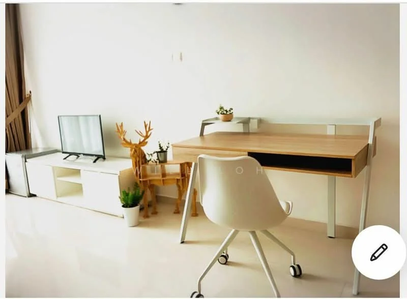 Study features: wooden desk with drawer, white ergonomic chair on wheels, flat-screen TV on low console, white console unit, decorative potted plants, light-colored walls, glossy tile flooring, natural light from window, wooden deer figurine; style: modern.