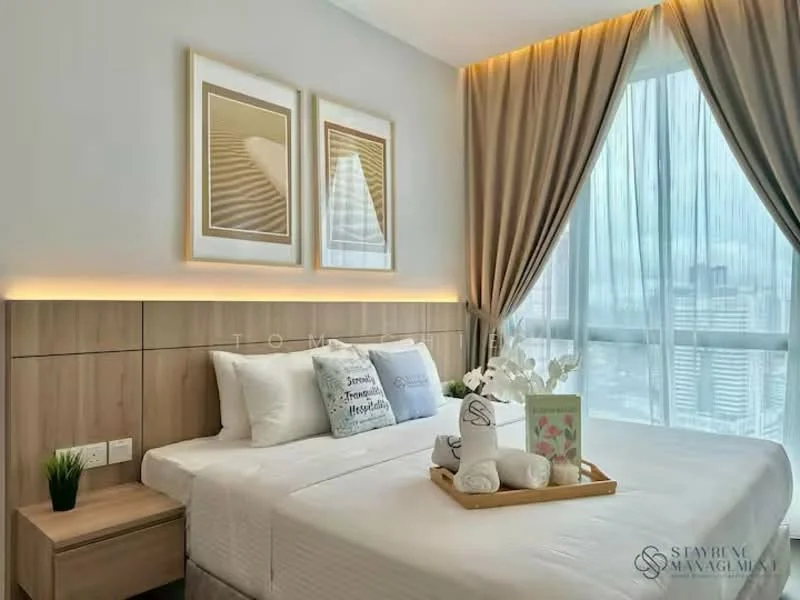Bedroom features: two single beds with white bedding, upholstered headboard, wooden bedside table, decorative pillows with text, framed artwork on walls, curtains with sheer and blackout layers, floor-to-ceiling windows, city view, light wood paneling on the wall, LED strip lighting above the headboard, decorative vase with flowers, small indoor plant; style: modern; view: city.