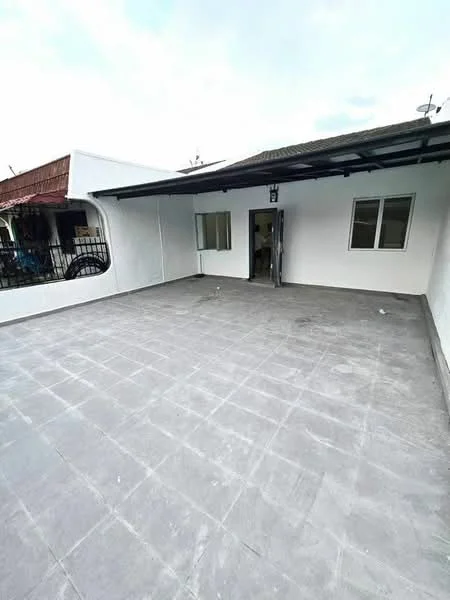 Exterior features: flat roof, white painted walls, grey tiled flooring, single door entrance, two windows, open space, no visible landscaping; style: modern.