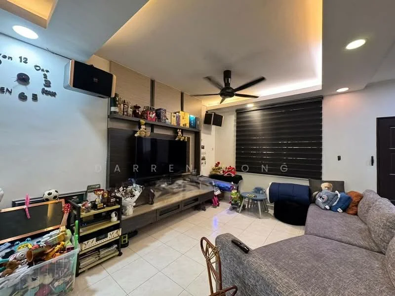 Living features: grey fabric sectional sofa, coffee table, wall-mounted TV, entertainment unit, 5-blade ceiling fan with light, recessed downlights, white painted walls, tile flooring, black roller blinds, decorative wall clock, shelves with decorative items, children's toys, area rug; style: modern.
