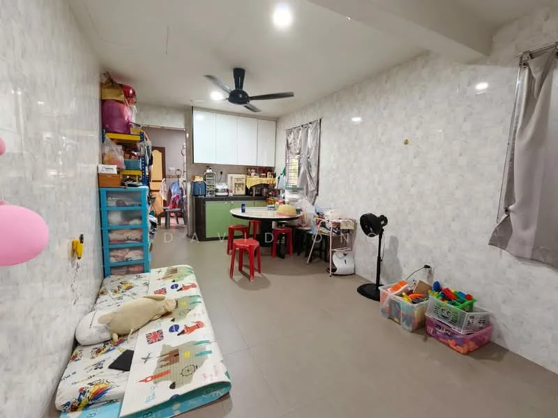 Living features: light grey painted walls, tile flooring, ceiling fan with light, dining table with chairs, sofa bed with colorful cushions, plastic storage bins, window with grey curtains, open kitchen area visible, wall-mounted shelves, decorative wall art; style: modern.