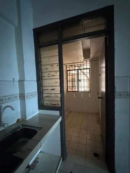 Kitchen features: single-bowl stainless-steel sink, chrome faucet, white tiled backsplash, cream laminate countertop, white tiled flooring, window with security bars, wooden door, built-in cabinetry, light fixture on ceiling. Room features: white walls, window with security bars, grey tiled flooring.