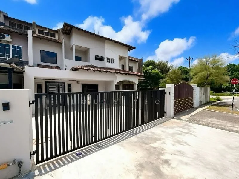 Exterior type: linked terrace house; features: black metal gate, paved driveway, two-storey building, white painted facade, brown tiled roof, front garden area, surrounded by greenery, street view, visible utility connections, nearby traffic sign; style: modern.