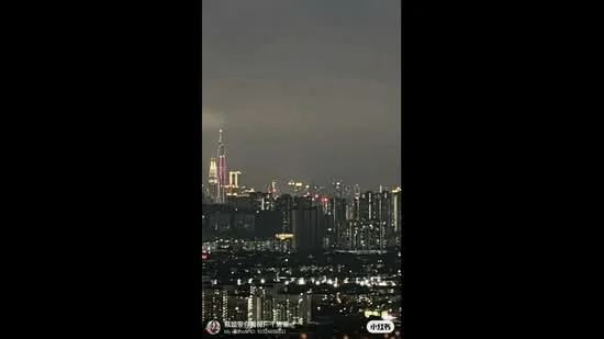 Exterior features: city skyline view, nighttime lighting, high-rise buildings, urban landscape; style: modern.