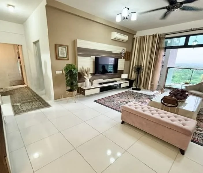 Living features: white painted walls, polished tile flooring, 5-blade ceiling fan with light, wall-mounted TV, wooden TV console, decorative wall paneling, large windows with city view, curtains, area rug with geometric pattern, upholstered pink ottoman, potted plant, coffee table; style: modern; view: city.