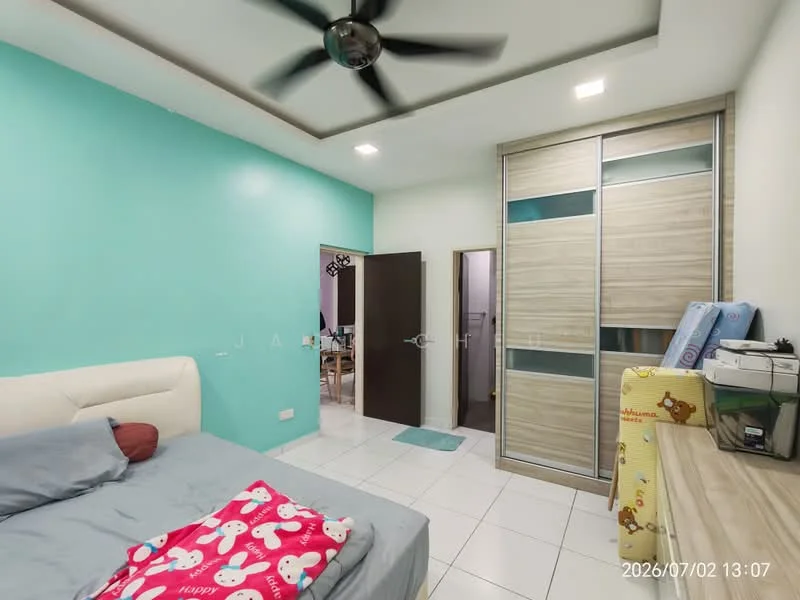 Bedroom features: light blue painted walls, white ceiling, 5-blade ceiling fan, white upholstered bed with headboard, grey bedding, red blanket with cartoon pattern, built-in wardrobe with sliding doors, white tiled flooring, door leading to hallway, visible bathroom door, decorative items on top of wardrobe; style: modern.