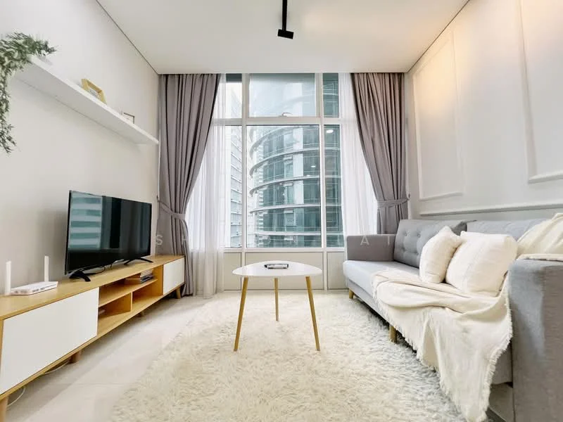 Living features: grey fabric sofa, white throw pillows, white area rug, wooden coffee table with gold legs, TV console with white and wood finish, wall-mounted TV, floor-to-ceiling windows, sheer curtains, decorative wall shelf, recessed lighting, neutral painted walls, light-colored flooring; style: modern; view: city.