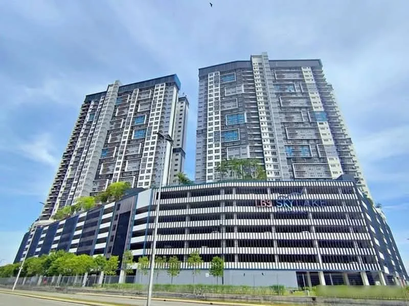 Exterior type: high-rise condominium; features: glass curtain wall, white painted facade, black and white striped design, multiple balconies, landscaped rooftop garden, surrounded by greenery, modern architectural design; style: modern.