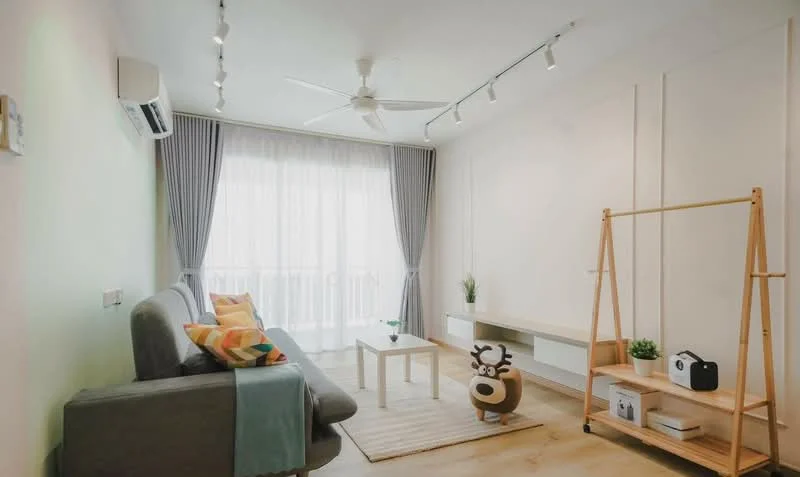 Living features: 3-seater fabric sofa in grey, colorful throw pillows, wooden coffee table, light-colored area rug, floor-to-ceiling windows with sheer curtains, ceiling fan with integrated LED light, wall-mounted TV console, decorative plant, clothes rack, decorative items on shelves; style: modern; view: city.