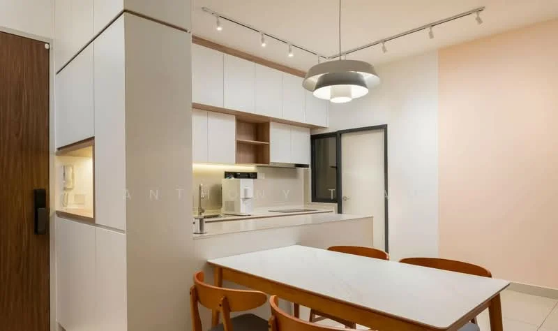 Kitchen features: white cabinetry with flat-panel doors, marble countertop, built-in oven, stainless-steel fridge, 4-burner gas hob, single-bowl stainless-steel sink, chrome pull-down faucet, pendant light fixture, track lighting, open shelving, dining table with white surface, 4 wooden dining chairs, cream painted walls, grey accent wall; style: modern.
