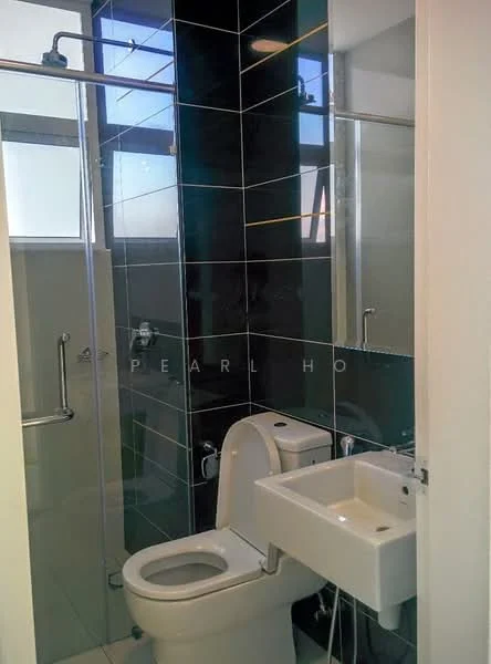 Bathroom features: black tiled walls, white ceramic sink, wall-mounted faucet, glass shower enclosure, toilet, chrome showerhead, sliding shower door, modern fixtures; style: modern.