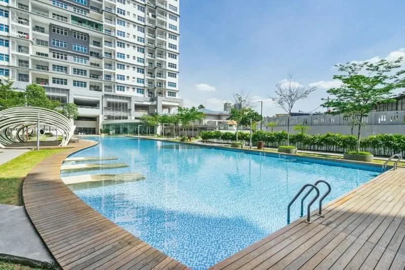Exterior type: high-rise condominium; features: infinity pool, pool deck with wooden flooring, landscaped garden with greenery, manicured lawn, surrounded by mature trees, modern architectural design, outdoor seating area, sun loungers by the pool; style: modern.