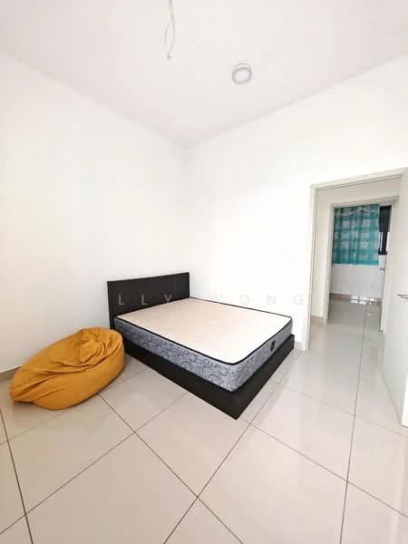 Bedroom features: white painted walls, tile flooring, queen-size bed frame without mattress, beige mattress, yellow bean bag, ceiling light, doorway leading to another room, window with sheer curtains.