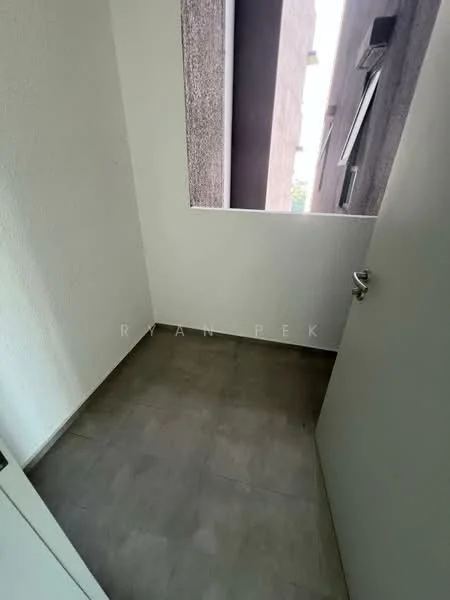 Room features: white painted walls, grey tile flooring, window with view of exterior wall, door with handle.