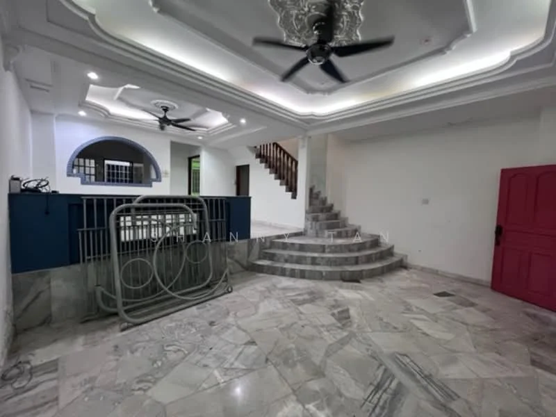 Room features: marble flooring, tray ceiling with decorative moulding, 2 ceiling fans, staircase leading to upper floor, white painted walls, blue accent wall, open space layout, arched doorway, decorative wall paneling, large windows, double doors in bright pink; style: modern.