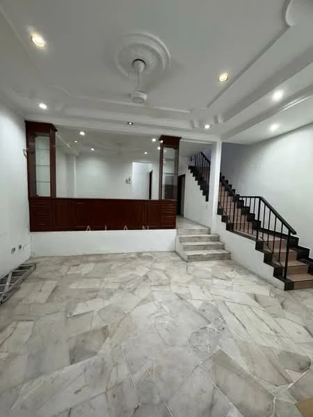 Room features: marble flooring, white painted walls, tray ceiling, recessed downlights, ceiling fan, wooden cabinetry, staircase with black railing, open space layout; style: modern.
