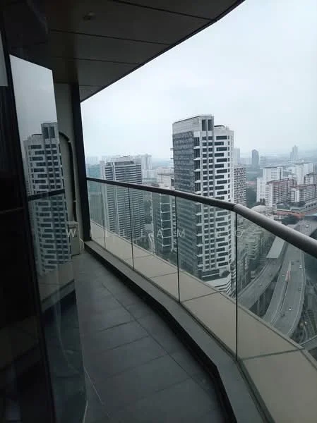 Room features: glass railing, grey tiled flooring, city skyline view, high-rise buildings in view, overlooking road, balcony space; style: modern; view: city.