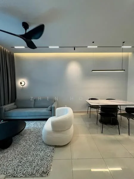 Living features: 3-seater fabric sofa in light grey, curved white accent chair, black round coffee table, area rug with geometric pattern, 5-blade ceiling fan, recessed LED downlights, wall-mounted sconce, grey painted walls, large dining table with black chairs, floor-to-ceiling curtains; style: modern.