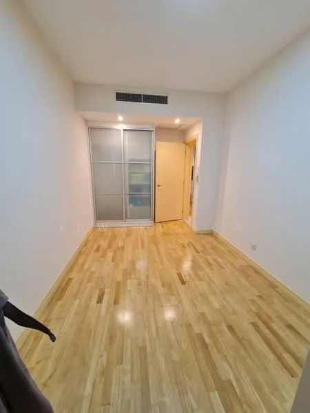 Room features: light wood flooring, white painted walls, sliding glass door, recessed downlights, single door, corner wall with no visible features; style: modern.