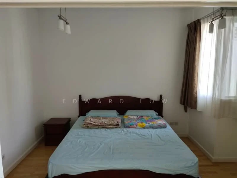 Bedroom features: queen-size bed, wooden bed frame, light blue bedspread, two decorative pillows, nightstand, curtains, wooden flooring, white painted walls.
