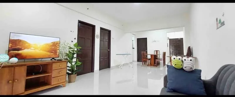 Living features: grey fabric sofa, wooden coffee table, wall-mounted TV, TV console with storage, decorative houseplants, white painted walls, glossy tile flooring, recessed ceiling lights; style: modern. Dining features: wooden dining table, four wooden dining chairs, white painted walls, glossy tile flooring; style: modern.