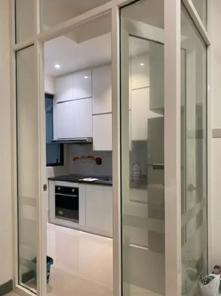 Kitchen features: white cabinetry, black countertop, built-in oven, stainless-steel stove, glass splashback, recessed lighting, tile flooring, sliding glass door, window with natural light; style: modern.