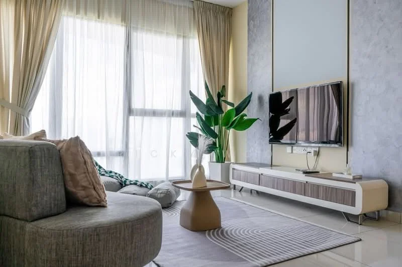 Living features: grey fabric sofa, decorative cushions, round coffee table, TV console with storage, wall-mounted TV, large floor-to-ceiling windows, sheer curtains, potted indoor plant, area rug with geometric pattern, light-colored walls, polished tile flooring; style: modern; view: city.