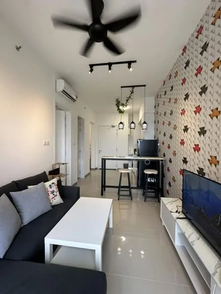 Living features: 3-seater fabric sofa in dark grey, white coffee table, wall-mounted TV, TV console, ceiling fan with 5 blades, recessed LED downlights, pendant lighting over kitchen counter, decorative wall with colorful star pattern, light grey tiled flooring, air conditioning unit, open-plan layout to kitchen; style: modern. Kitchen features: bar counter with stools, black countertop, stainless-steel appliances, open shelving, white cabinetry, backlit wall feature; style: modern.