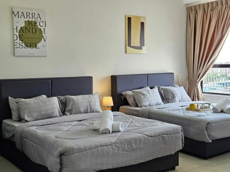 Bedroom features: two queen-size beds with grey upholstered headboards, grey bedding with decorative pillows, white towels rolled on the beds, nightstand with a lamp, framed artwork on the wall, decorative wall art, curtains in a light brown color, floor-to-ceiling window with city view, tile flooring, decorative plant in the corner; style: modern; view: city.