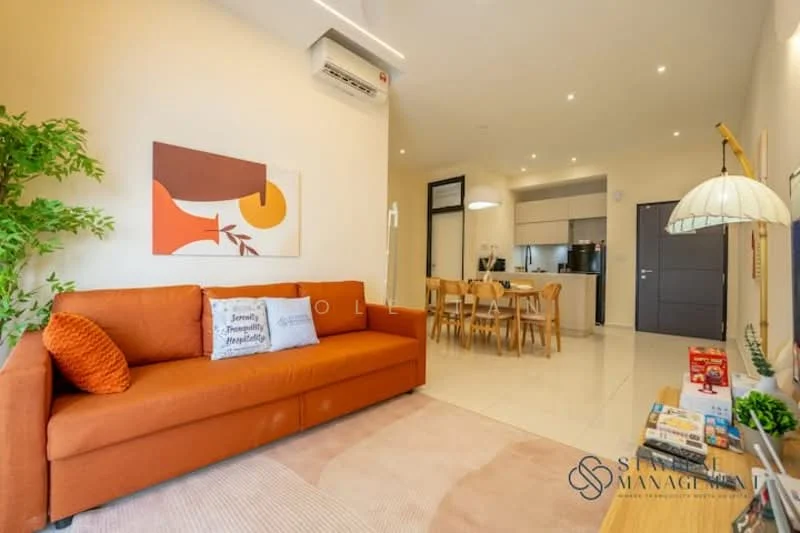 Living features: orange fabric sofa, decorative cushions, coffee table, wall-mounted TV, area rug, floor-to-ceiling windows, recessed LED downlights, split wall-mounted air conditioning unit, decorative wall art, indoor plant, dining area with wooden dining table and chairs; style: modern. Kitchen features: kitchen island, stainless-steel appliances, white cabinetry, black countertop, open shelving, recessed lighting; style: modern.