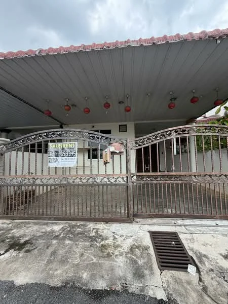 Exterior type: semi-detached house; features: metal gate, covered porch, red lanterns hanging from ceiling, concrete flooring, white painted walls, sloped roof with tiles, front yard, visible drainage, for sale/rent sign; style: traditional.
