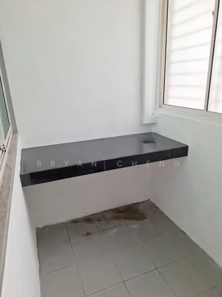 Room features: black countertop, white painted walls, grey floor tiles, window with horizontal blinds, corner space.