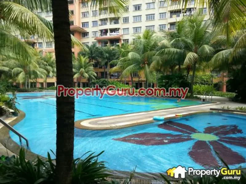 Exterior type: swimming pool deck; features: large swimming pool, tropical landscaping with palm trees, pool deck with loungers, decorative flower pattern on pool floor, surrounding residential buildings, lush greenery; style: tropical-modern.