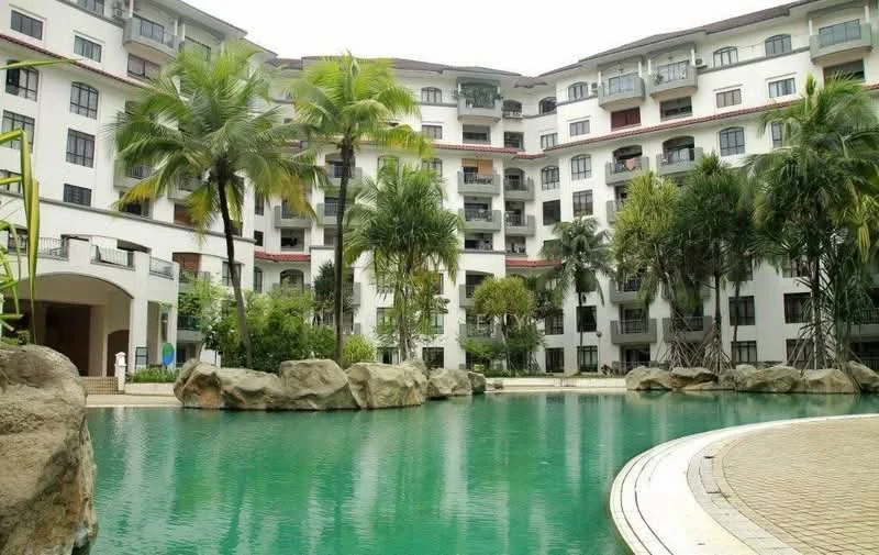 Exterior type: mid-rise condominium; features: swimming pool with rock features, tropical landscaping with palm trees, manicured garden area, multiple balconies on upper floors, white painted facade, red tiled roof, stone-paved walkway, surrounded by greenery; style: tropical-modern.
