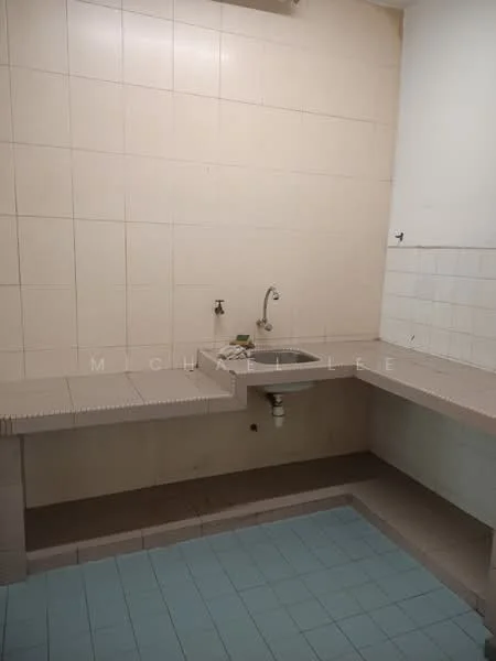 Kitchen features: single-bowl stainless-steel sink, chrome faucet, light beige tiled walls, light blue tiled flooring, countertop with light beige finish, wall-mounted faucet, no visible appliances, no cabinetry, minimalist design; style: minimalist.